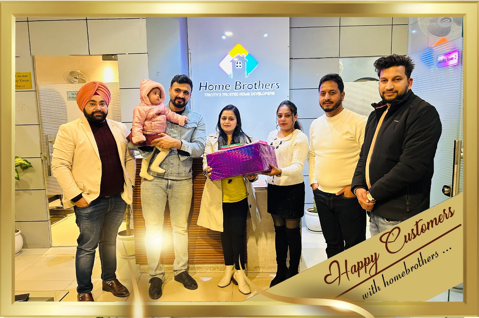 Group photo of happy Aashiana Greens customers celebrating property purchase and satisfaction at the residential plots project in Kurali, Punjab.